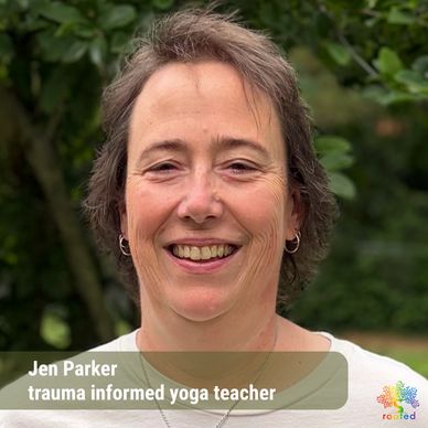Jen Parker, trauma-informed yoga teacher, smiling outdoors.