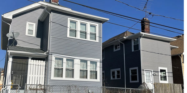After pictures: Two homes completed that were part of an exterior home repair program in 2023.