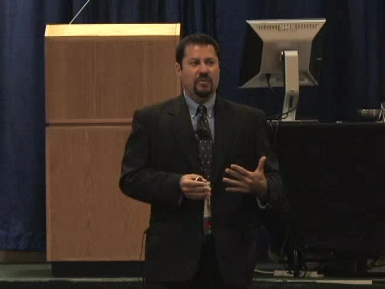 Doug lecturing on emergency management techniques for spine-injured athletes