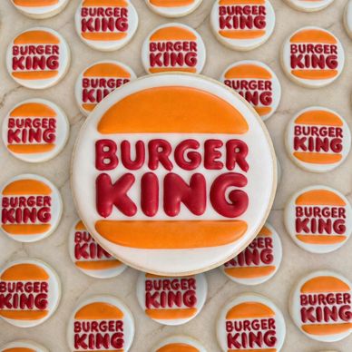 Cookies decorated with the Burger King logo in red and orange icing.