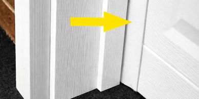 Vinyl trim with weather stops designed for garage doors.