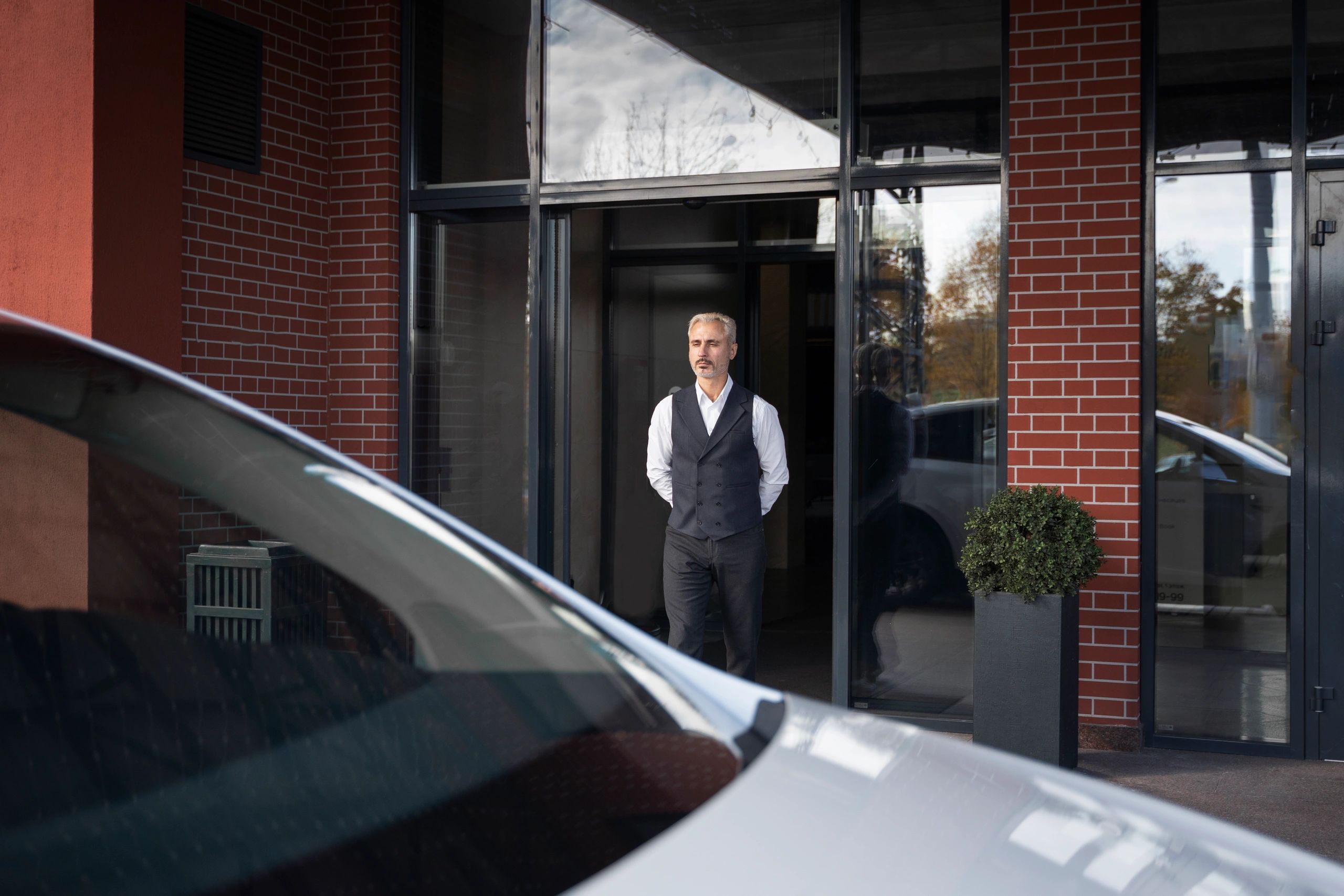 Concierge security officer managing access at a residential or commercial property in London