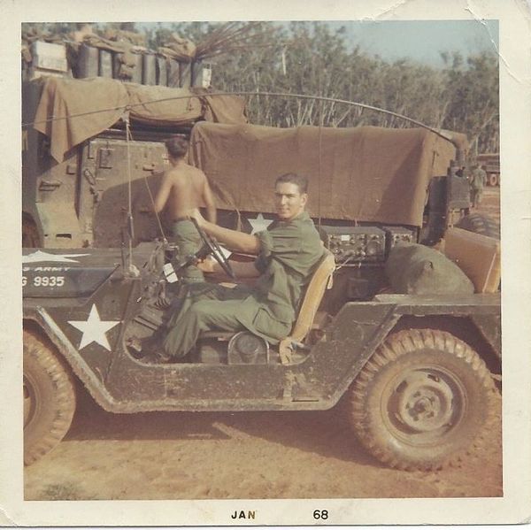 Soldier sitting in a military jeep in January 1968.