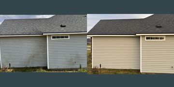 Dirty vinyl siding next to clean vinyl siding after being pressure washed