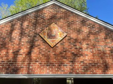 copper-metal-wall-art-exterior-brick-home-installation.jpg