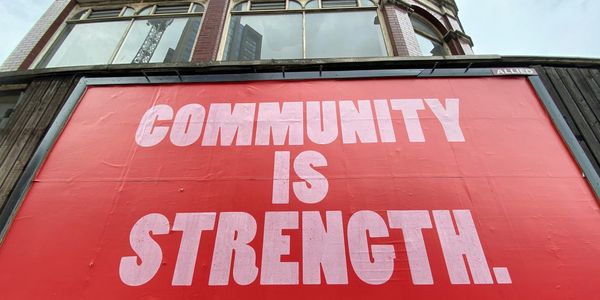 Community is strength billboard