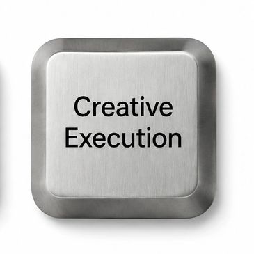Metal button labeled 'Creative Execution'.