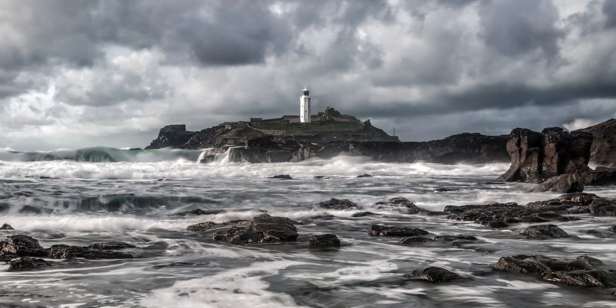 Stormy sea with a lighthouse