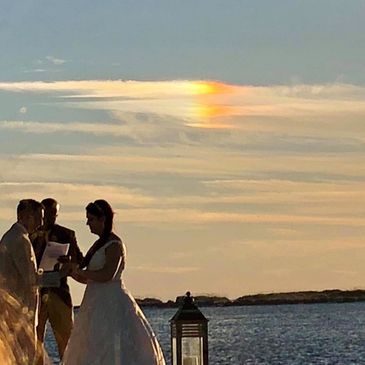 Bride and Groom under a sundog rainbow