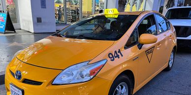 Toyota Prius Yellow Taxi Cab available for rent. www.picturecarslosangeles.com