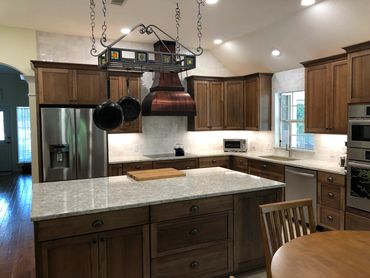 Kitchen Remodeling Company Atlanta GA  picture showing old pot hanger above the kitchen island.