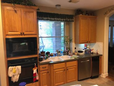 Kitchen Remodeling Company project picture in Marietta, GA of an old sink cabinet area.