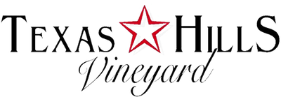 Logo of Texas Hills Vineyard featuring a star.