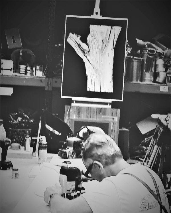 Artist J. Vint, developing his natural wood art creations, circa 2016.