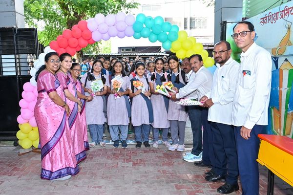 Group photo of students and teachers at a school event.