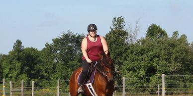 Kelsey and her current young horse, She Sure Can Dance (Tango).