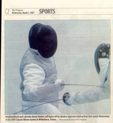 Fencer Dimitri Cuff hits his opponent during 2007 Canada Winter Games.
