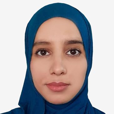 Portrait of a woman wearing a blue hijab.