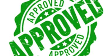 Green 'Approved' stamp with stars and circular design.