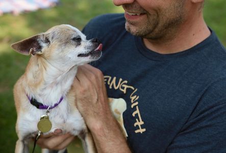 Gizmo (who was adopted June 2020) with our amazing volunteer Dan!