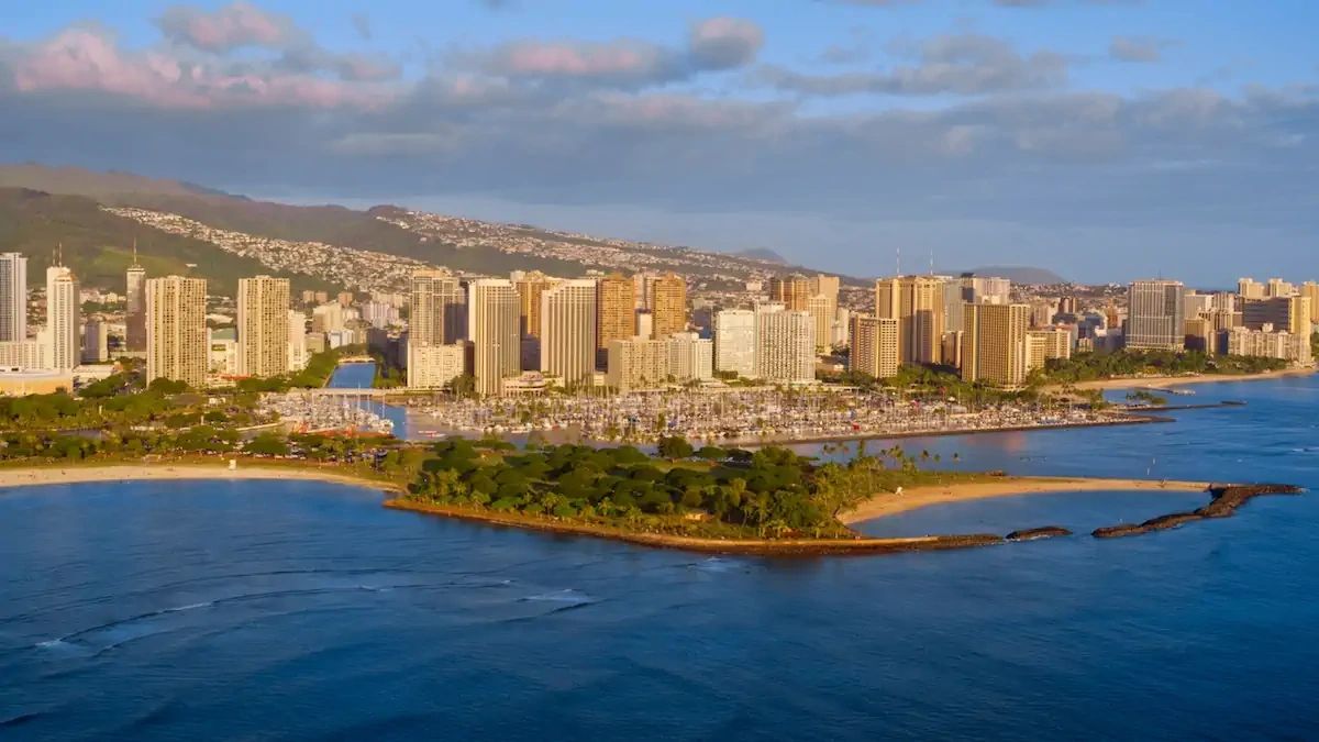 Overview of Magic Island and the Honolulu boat harbor at Waikiki Beach.