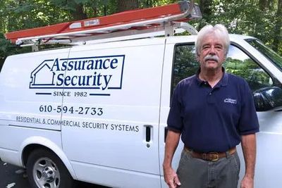 image of a man Standing In Front Of Van