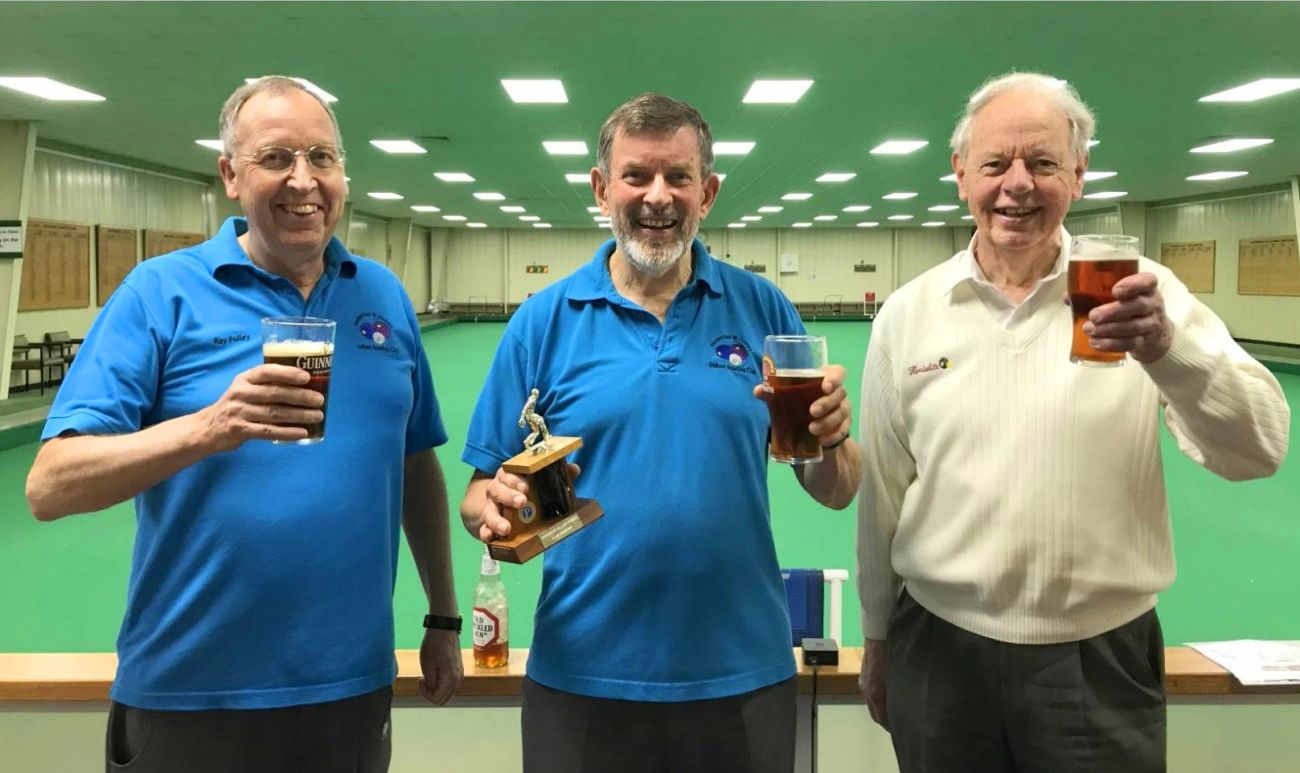 Members celebrating victory at the club bowls tournament