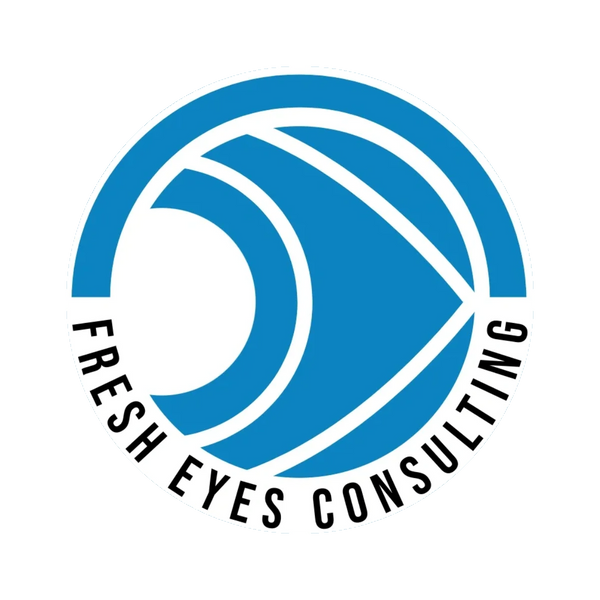 Logo of Fresh Eyes Consulting with a blue and white eye design.