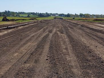 Road building. Grading dirt. Dirt work.