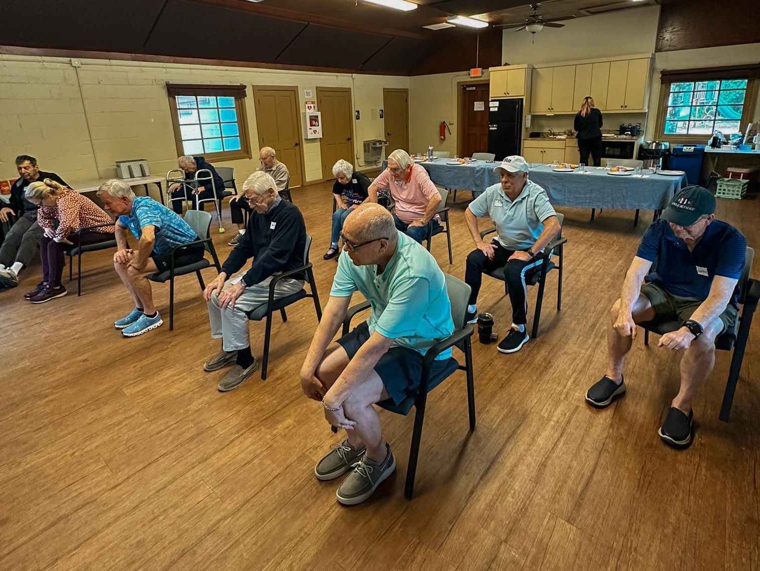 Participants doing chair exercises