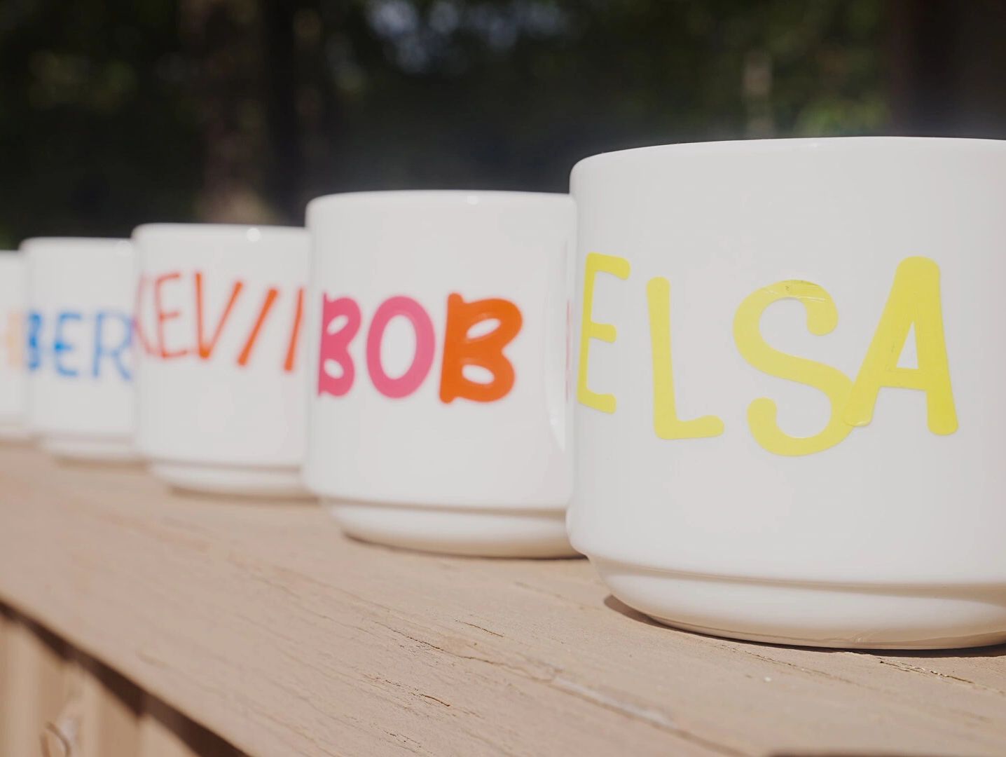 Cups with names on them in different colors