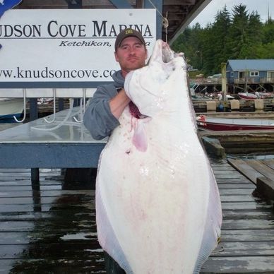 Captain Ty with a halibut.  Delicious, flaky white meat.  To the Limit Sportfishing Ketchikan AK