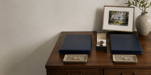 Two organized sets of household assets representing fair property division during divorce