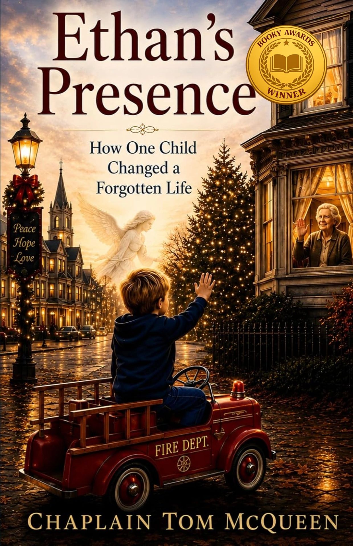 A boy in a toy fire truck waves to a woman in a warmly lit house during Christmas.