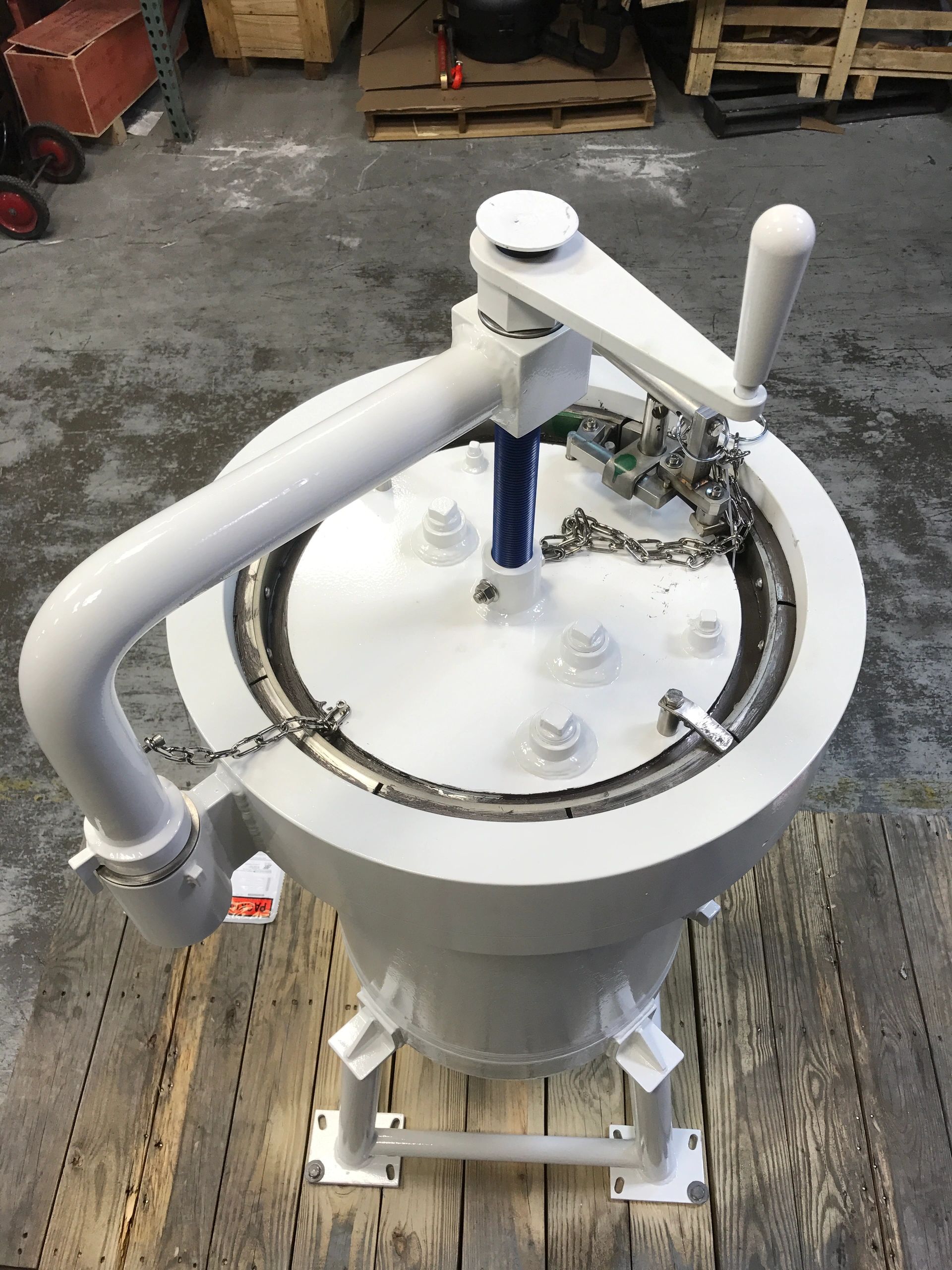 8" vertical locking band closure installed on vessel. Includes hand crank and davit. ASME CL300