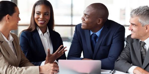 Group of people discussing with each other