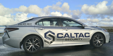 Security Guard in Sacramento CA patrol car working for CALTAC Security.
