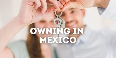 Couple with keys to new home in Mexico. Can foreigners buy in Mexico? Born to be venture. home key.