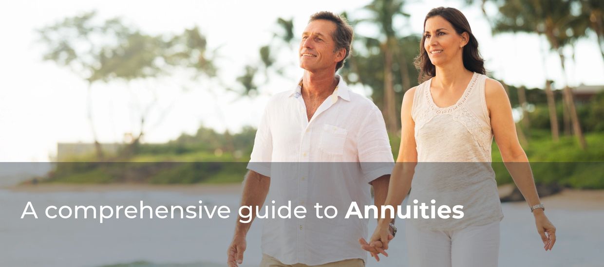 A happy couple walks hand in hand on a beach, symbolizing financial security through annuities.
