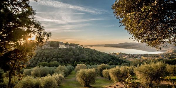 Umbria, Italy. Rolling hillsides, olive groves, vineyards, the Borghi ... perfect vacation. 

