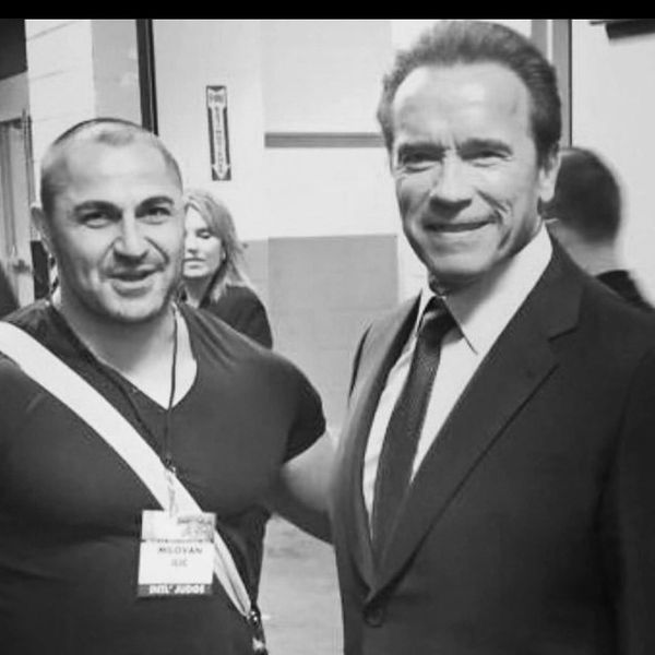Arnold Schwarzenegger with TrainerMika