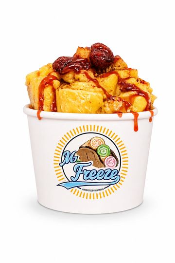 A cup of dessert topped with fruit and syrup from No Freeze.