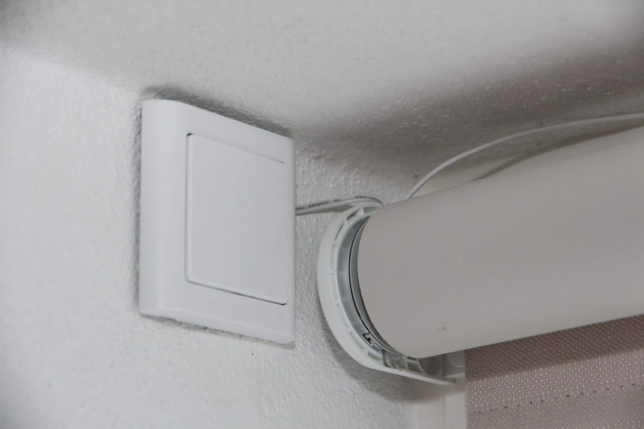 "Effortless Control at Your Fingertips: Adjust your roller blinds with ease using a sleek, convenient remote control for a seamless blend of style and functionality."