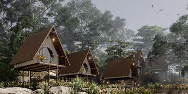 Four elevated A-frame cabins surrounded by lush greenery and misty forest.