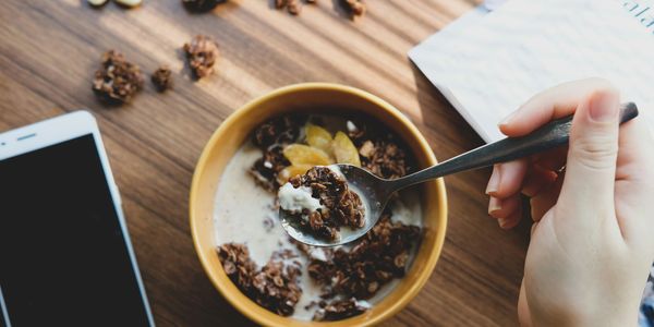 Home-made muesli, with fruits and kefir contains prebiotics and probiotics for better gut health.