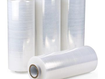 Four rolls of clear stretch wrap film.