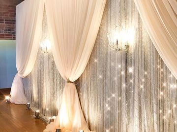 Wedding backdrop, luxury backdrop, linens and lighting