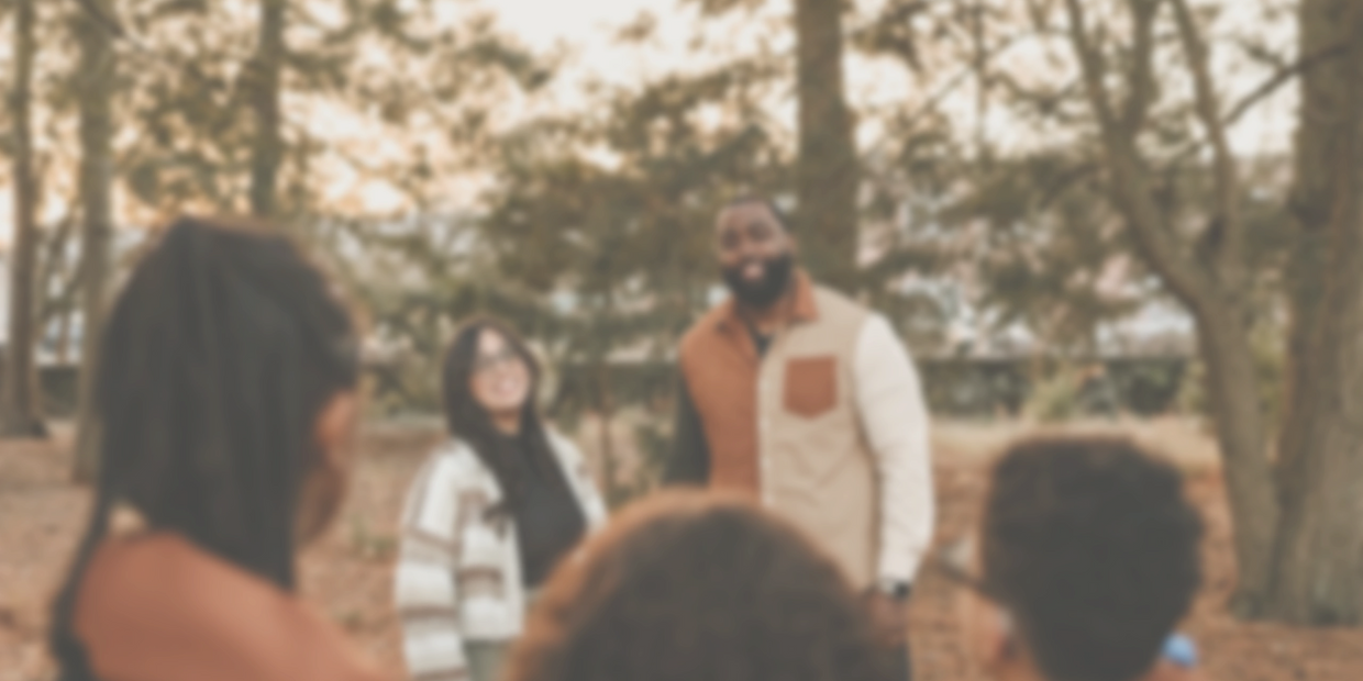 Owner and family enjoying a casual outdoor gathering in autumn.