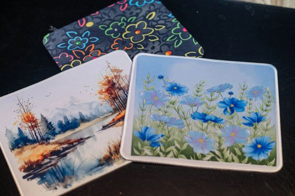 Assorted makeup bags with quotes like