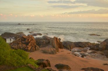 Rocky beach at sunset.